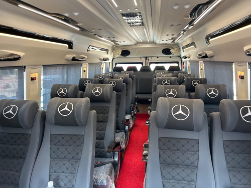 Spacious 26 seater Tempo Traveller interior